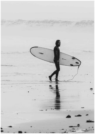 surfer walking on beach poster