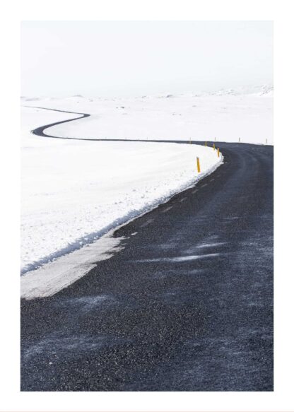 Plowed road in snowy environment poster