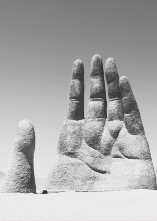 Sculpture hand in the sand poster