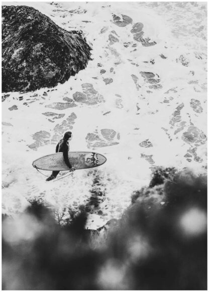 man with his surfboard poster